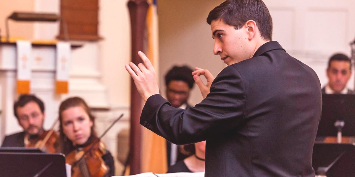 Founding Music Director Matthew Scinto conducting Cape Cod Chamber Orchestra at its debut performance, 2018, by Jean Kirby Photography